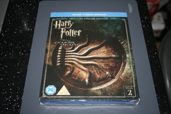 HARRY POTTER AND THE CHAMBER OF SECRETS TWO-DISC SPECIAL EDITION BLU-RAY BRAND NEW. CERT PG. + SLIP COVER.